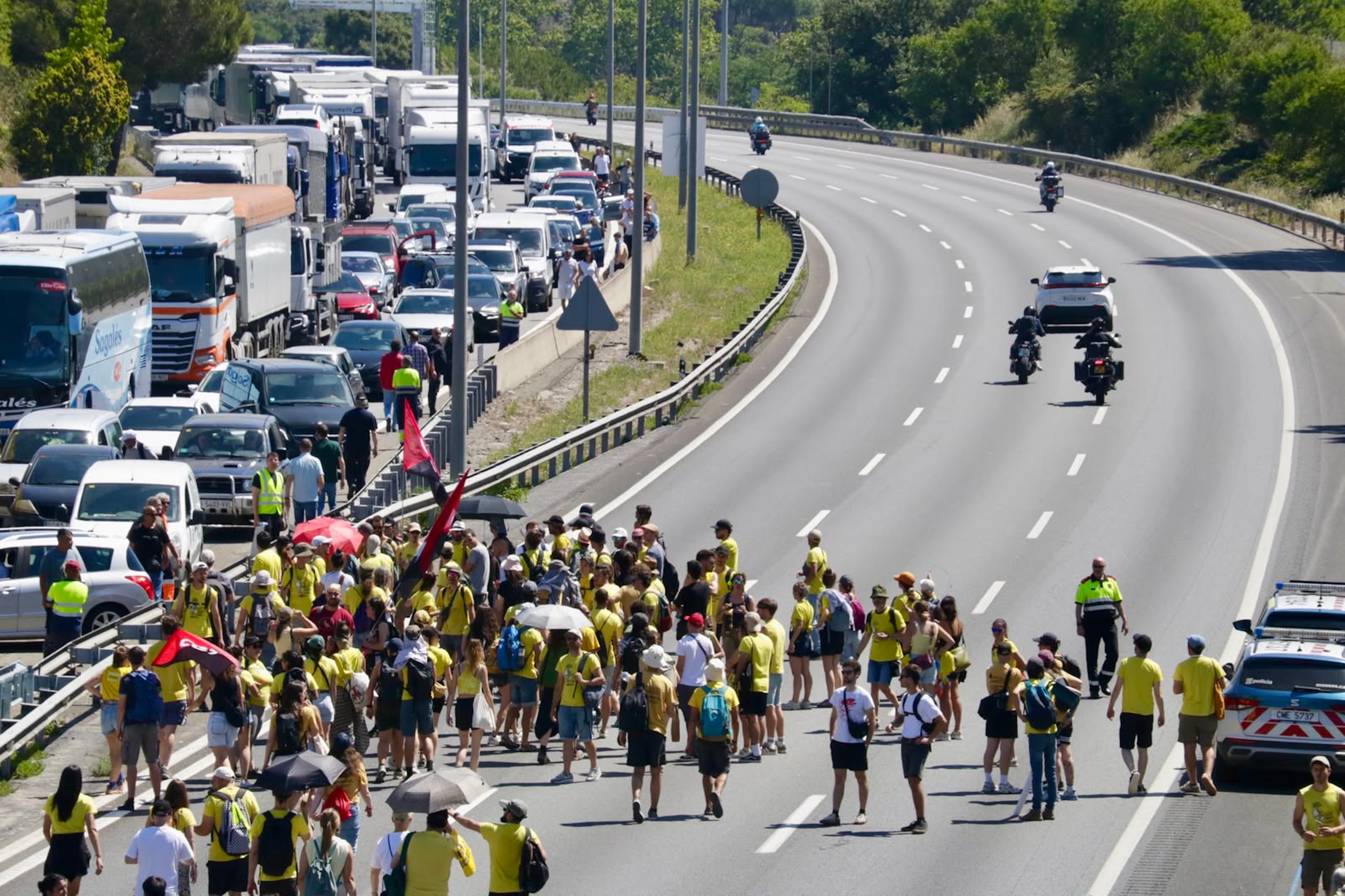 Teachers block traffic on the AP-7 at Granollers