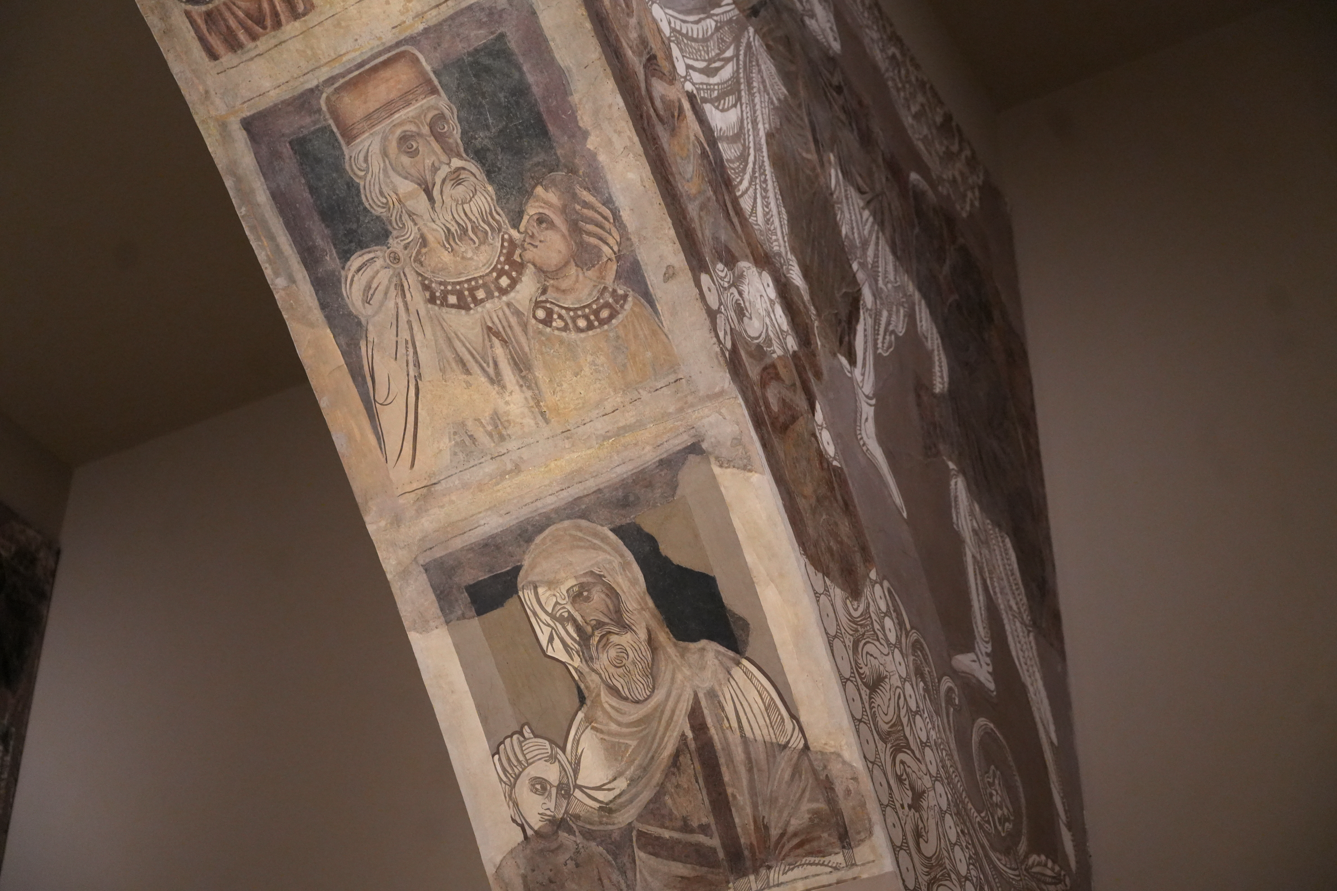 A section of the medieval Romanesque paintings from Sixena on display in the National Art Museum of Catalonia