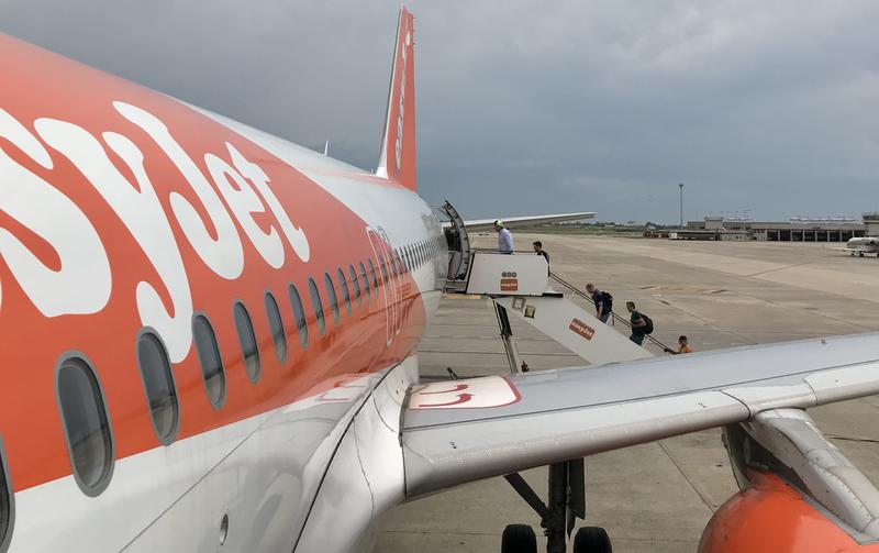 Easyjet travelers boarding a plane in Barcelona airport