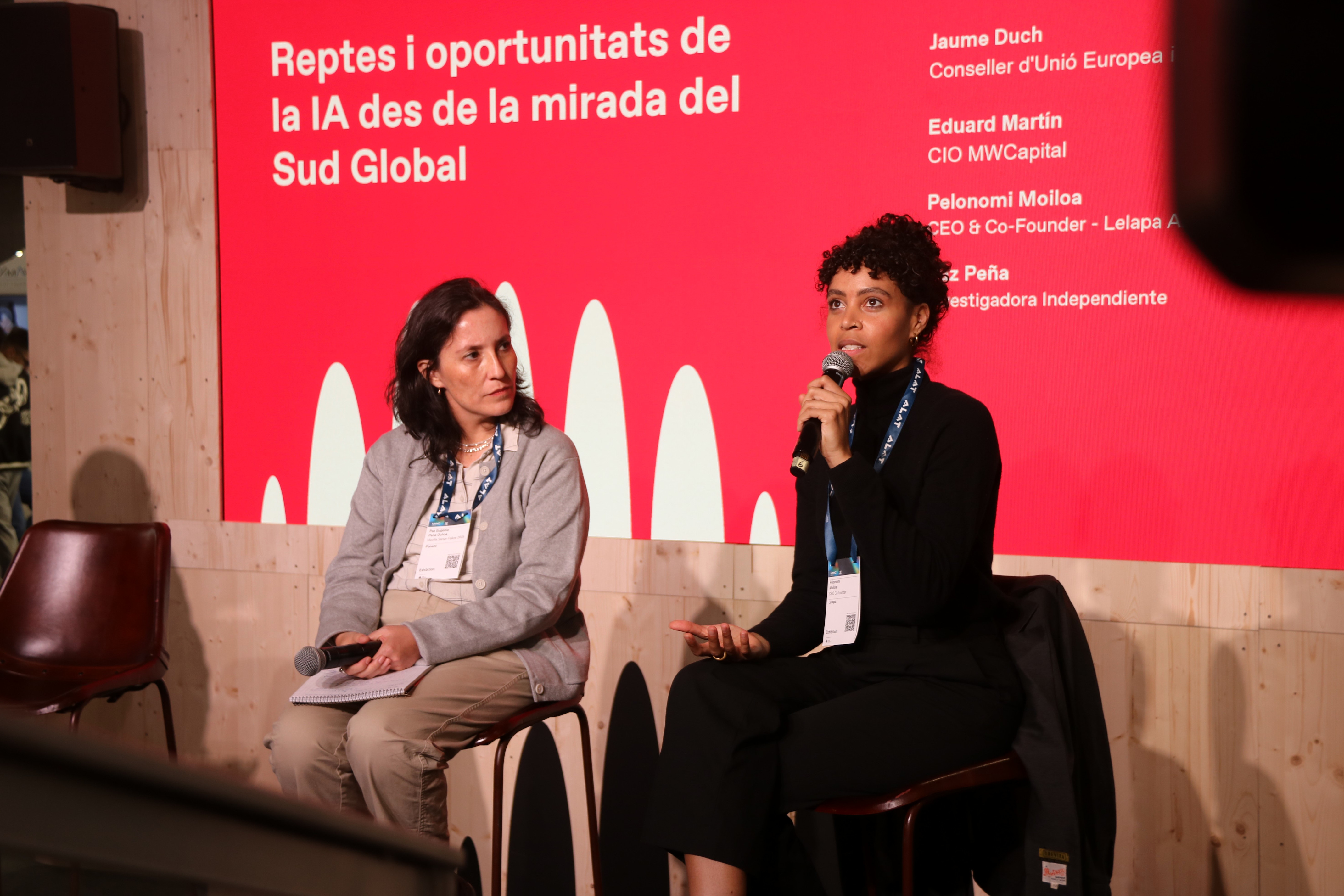 Researcher Paz Peña and data scientist Pelonomi Moiloa photographed during the roundtable discussion on AI at the Mobile World Congress