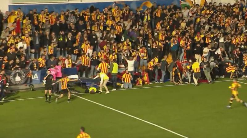 A screenshot from the Beteve broadcast of the game showing the moment the wall behind the goal where Sant Andreu fans were collapsed