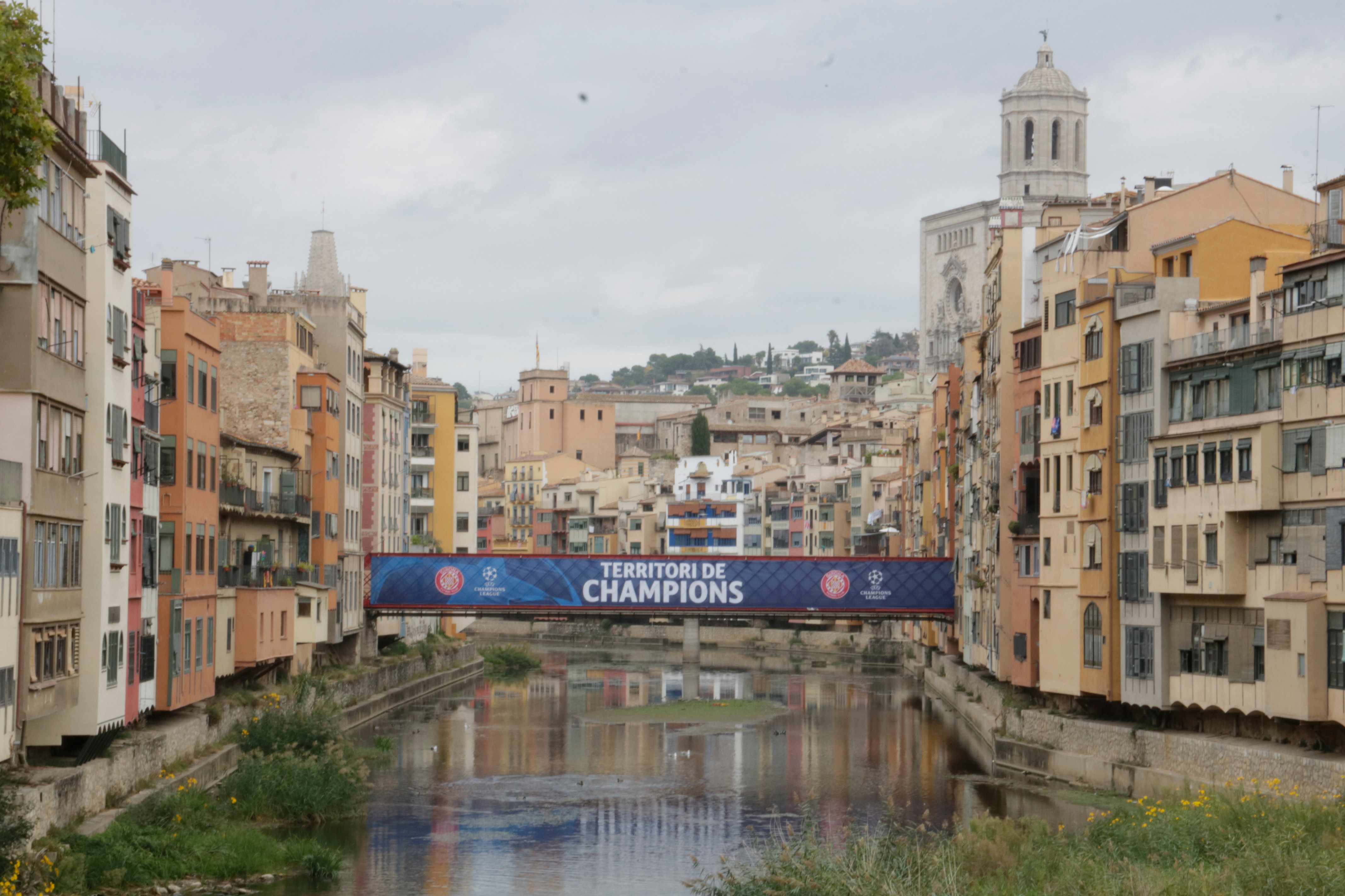 A poster in Pont del Ferro to celebrate the first Champions League match in Girona