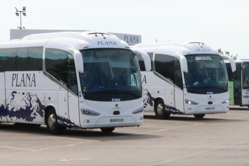 Two school buses parked in Vilanova i la Geltrú where the 3-year-old girl was found