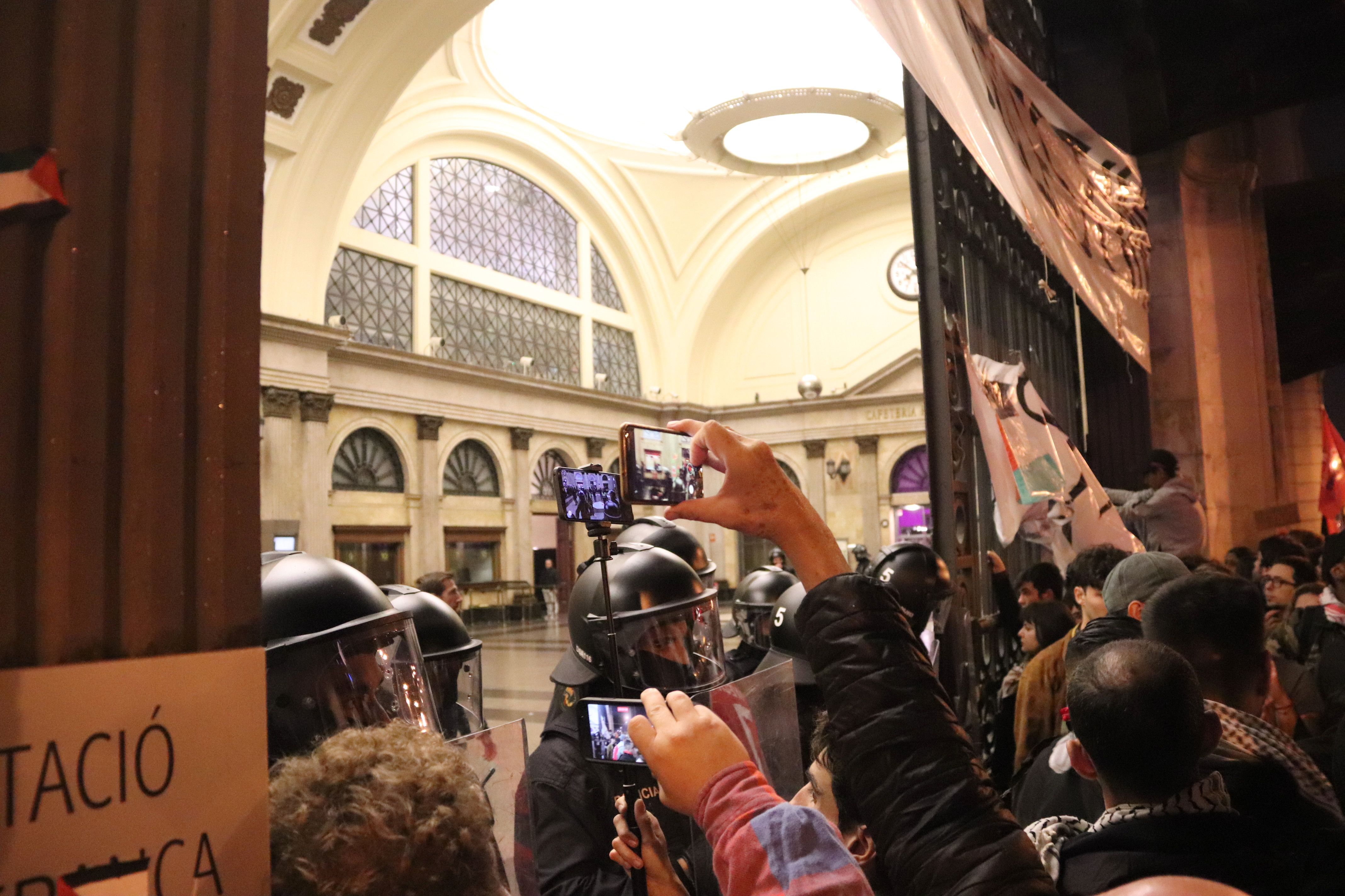 Mossos d'Esquadra police block the entrance to Barcelona Estació de França train station after a demonstration in Barcelona on November 11, 2023
