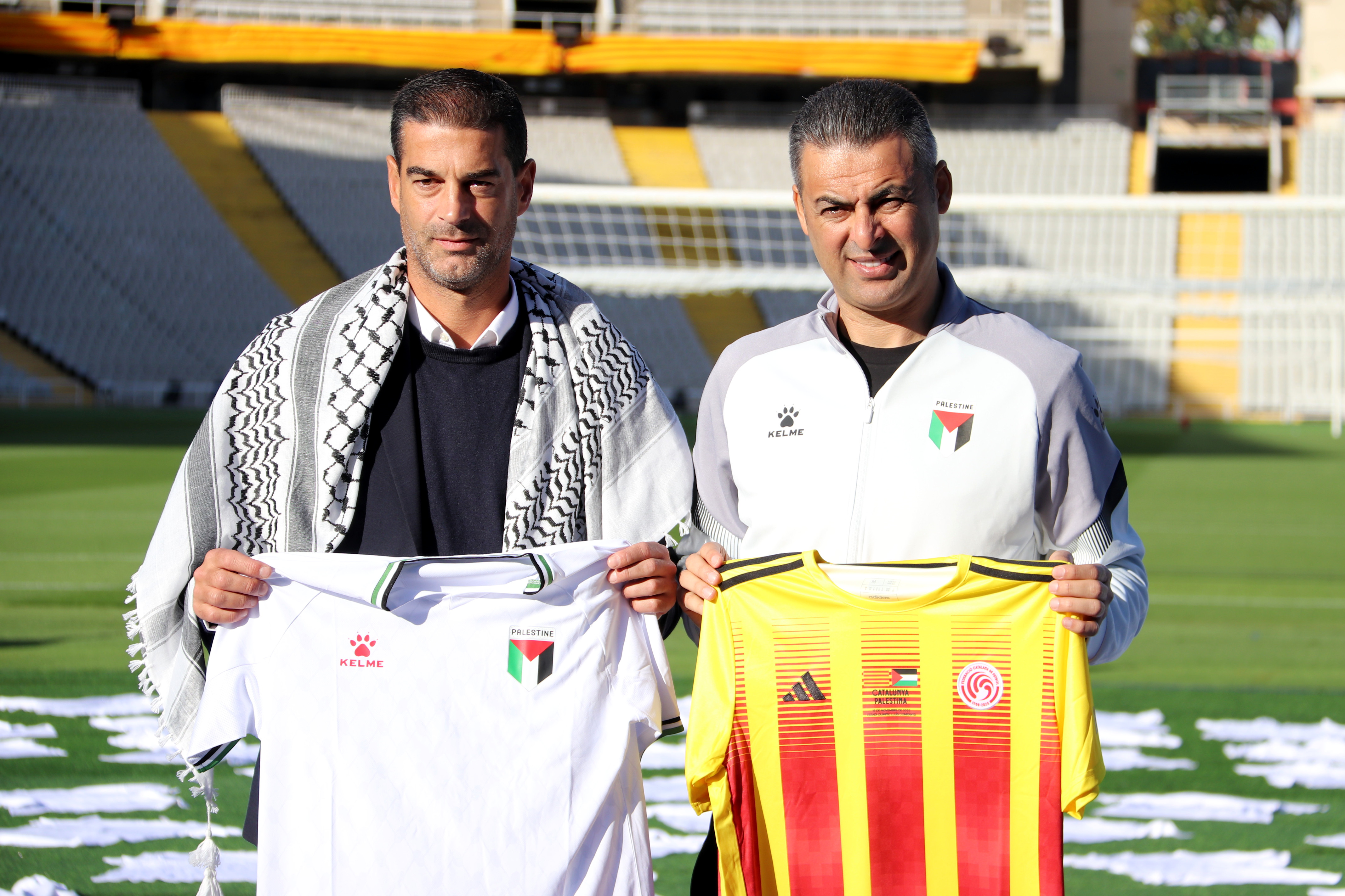Catalonia’s national team coach Gerard López and Palestine’s national team coach Ihab Abu Jazar during the presentation of the Catalonia–Palestine match at Barcelona’s Olympic Stadium