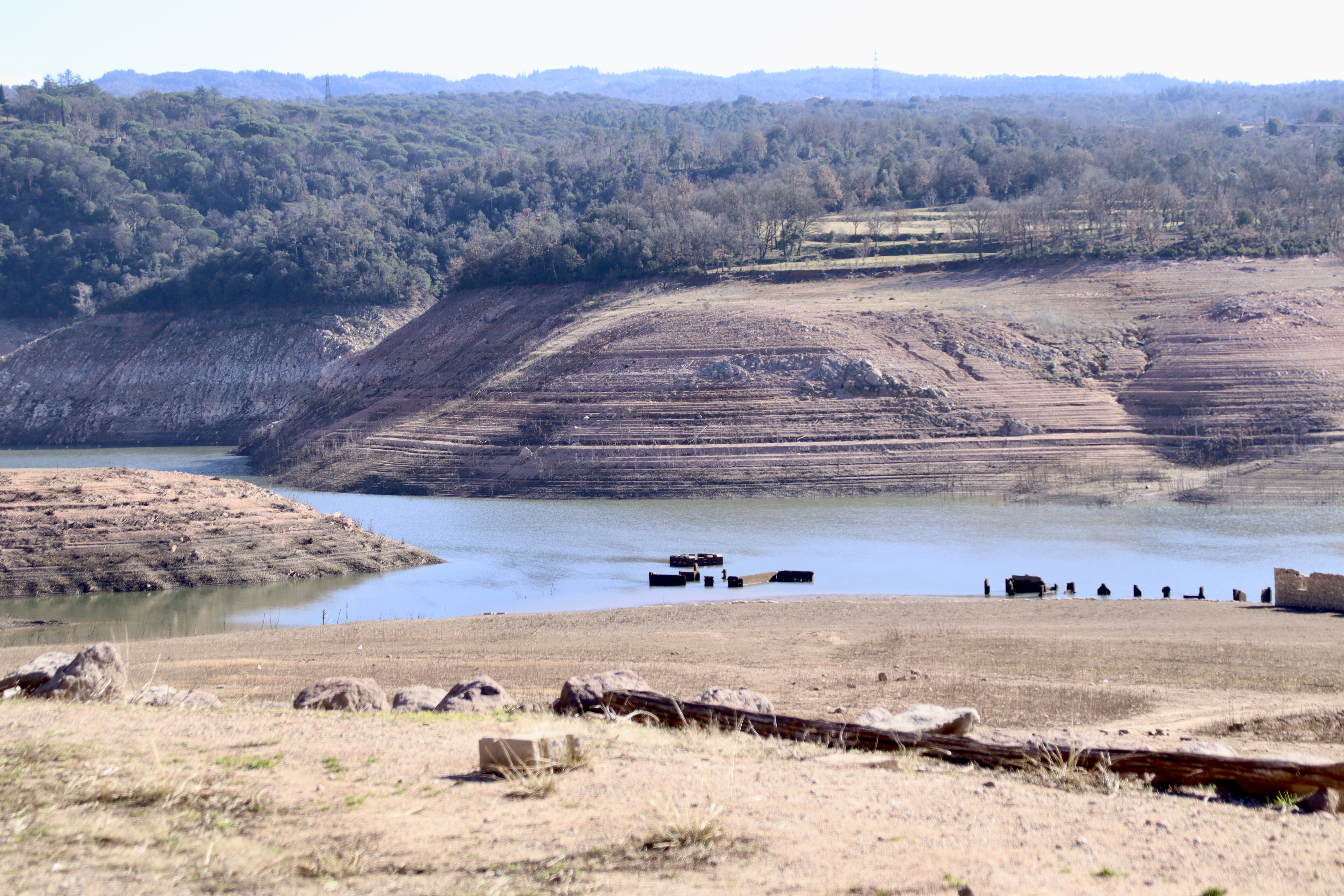 Remains of the old Sant Romà de Sau village emerge as Sau reservoir gets empty