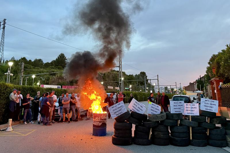 Workers block the access to the Freixenet building