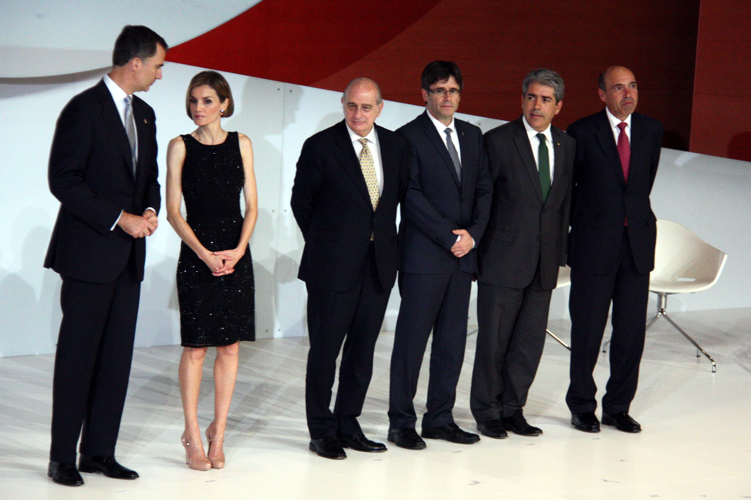 Spain's monarchs accompanied by, at the time, Spain's interior minister Jorge Fernández-Díaz, Girona mayor Carles Puigdemont, and Catalan presidency minister Francesc Homs during an award ceremony of the Prince of Girona Foundation Awards on June 26, 2014