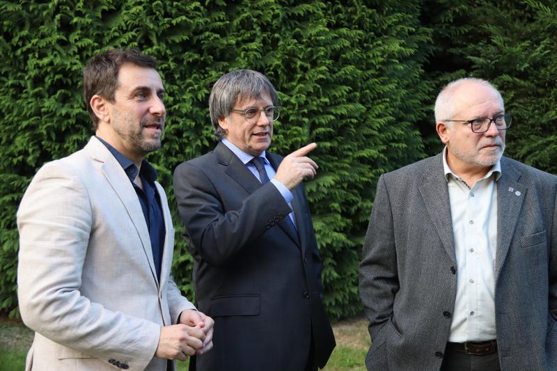 From left to right: former Catalan minister Toni Comín, former Catalan president Carles Puigdemont and former Catalan minister Lluís Puig