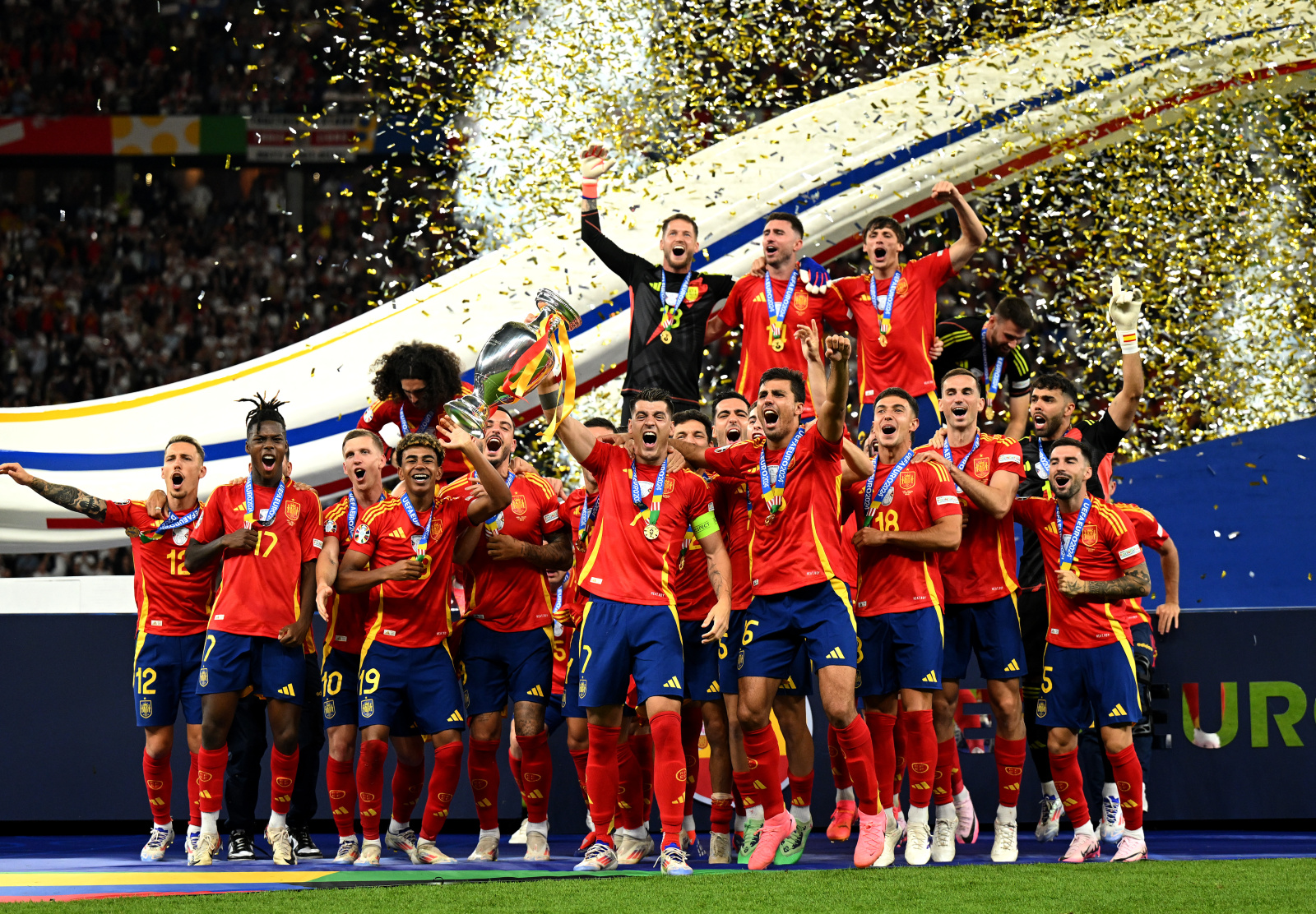 Alvaro Morata of Spain lifts the UEFA Euro 2024 Henri Delaunay Trophy after his team’s victory during the UEFA EURO 2024 final match between Spain and England at Olympiastadion on July 14, 2024 in Berlin, Germany.