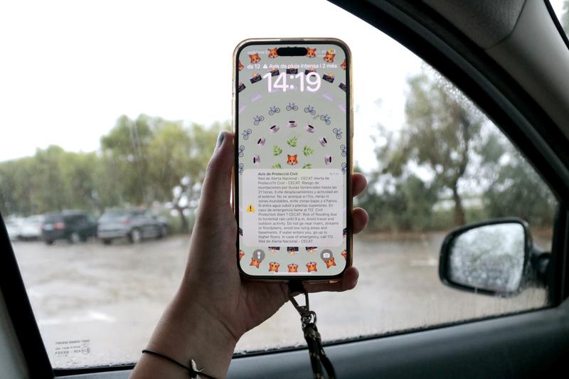 A phone receives the flood alert on Saturday