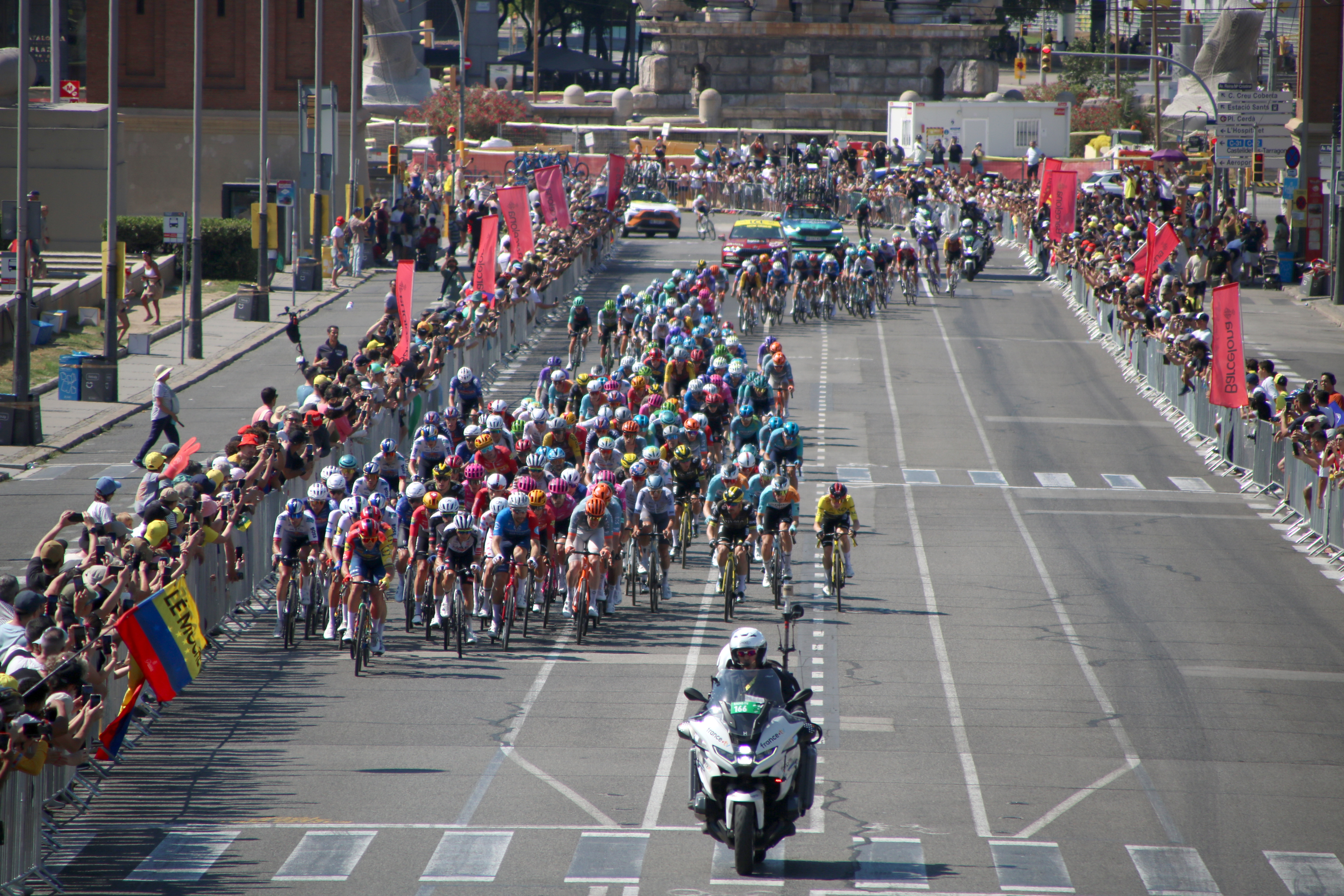 The Tour cyclists arriving at 4:56 pm at the final stretch of Stage two at Montjuïc