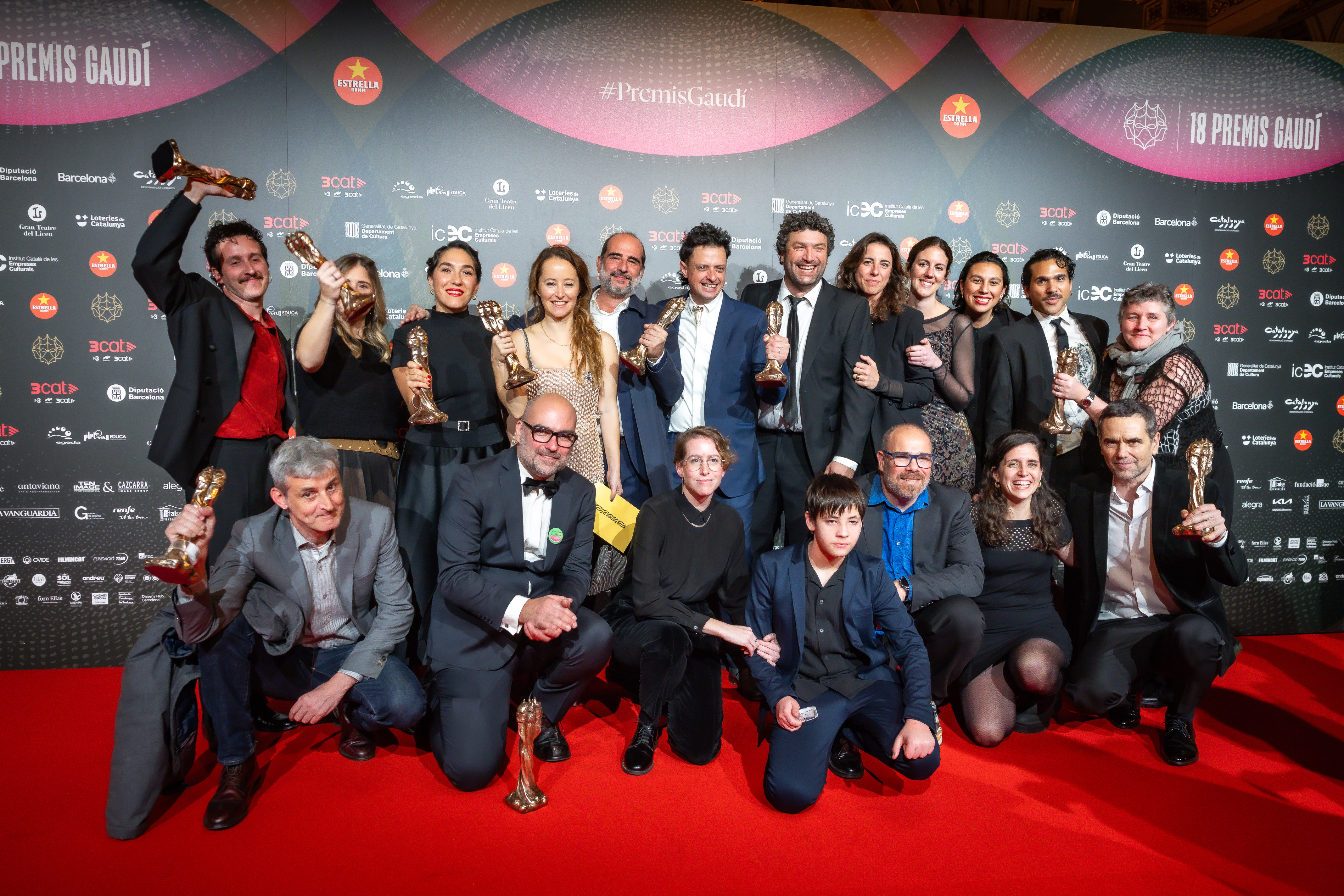 Members of the cast and crew of Sirat celebrate their eight awards