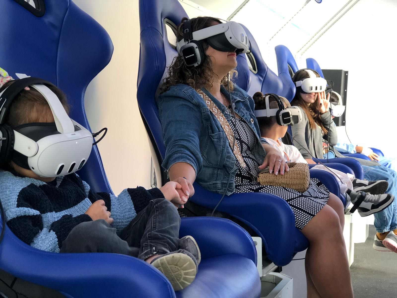 Some of the patients and family members enjoying the VR spacewalk experience during World Mental Health Day on October 10, 2024 at Vall d'Hebron hospital