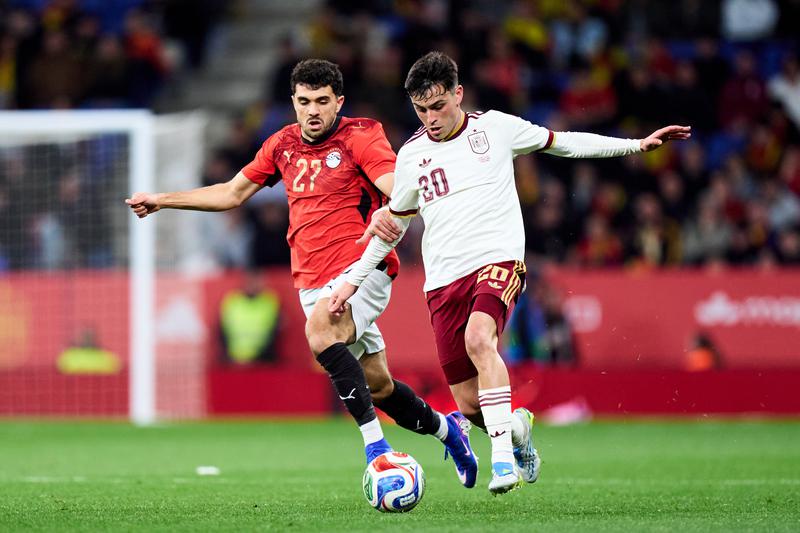 FC Barcelona's Pedri runs with the ball during Spain's friendly match against Egypt in the RCDE Stadium