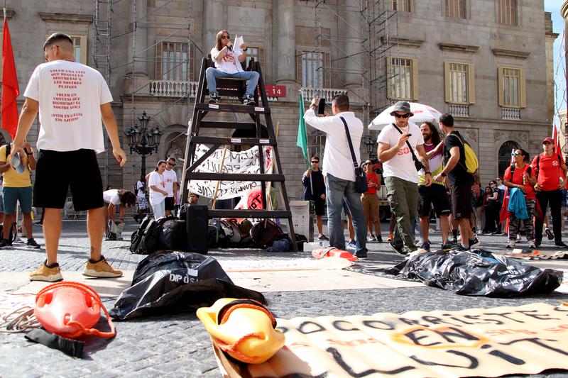 Lifeguards protesting at Barcelona's Plaça Sant Jaume on June 12, 2024