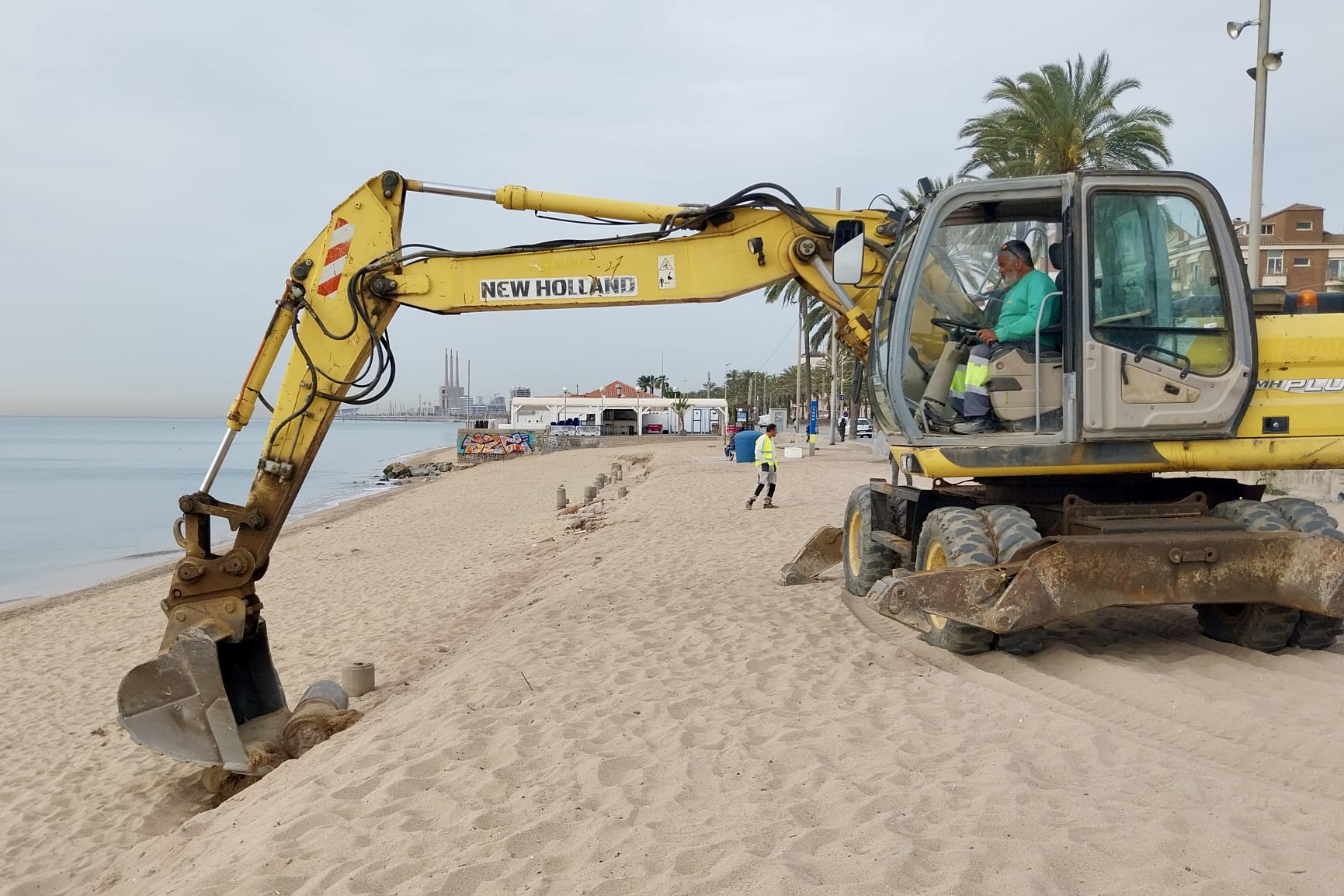 Works to remove structures that became visible on Badalona beach following Easter's Storm Nelson