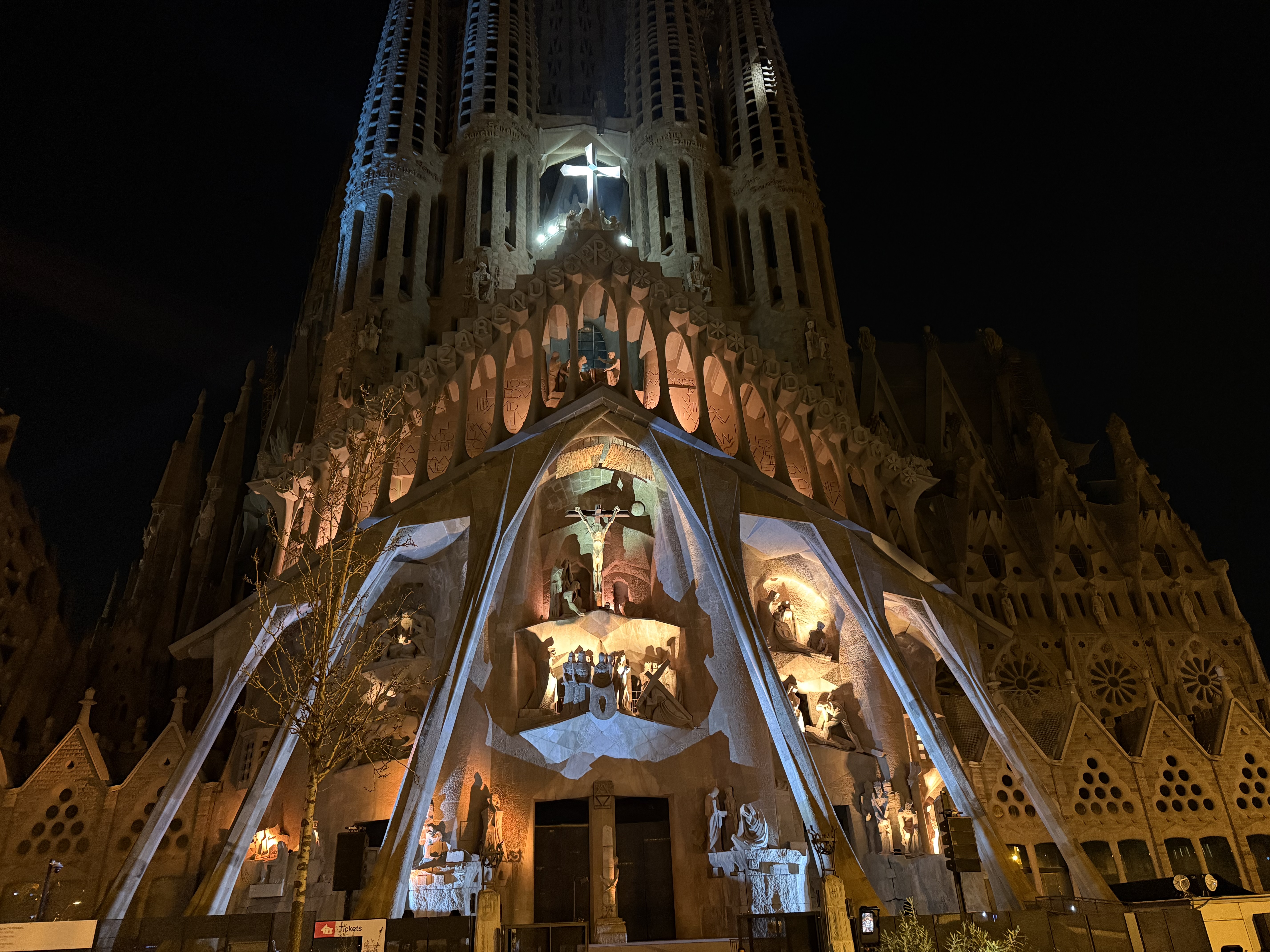 The Passion Façade of the Sagrada Família illuminated with the liturgical narrative of the last days of Jesus