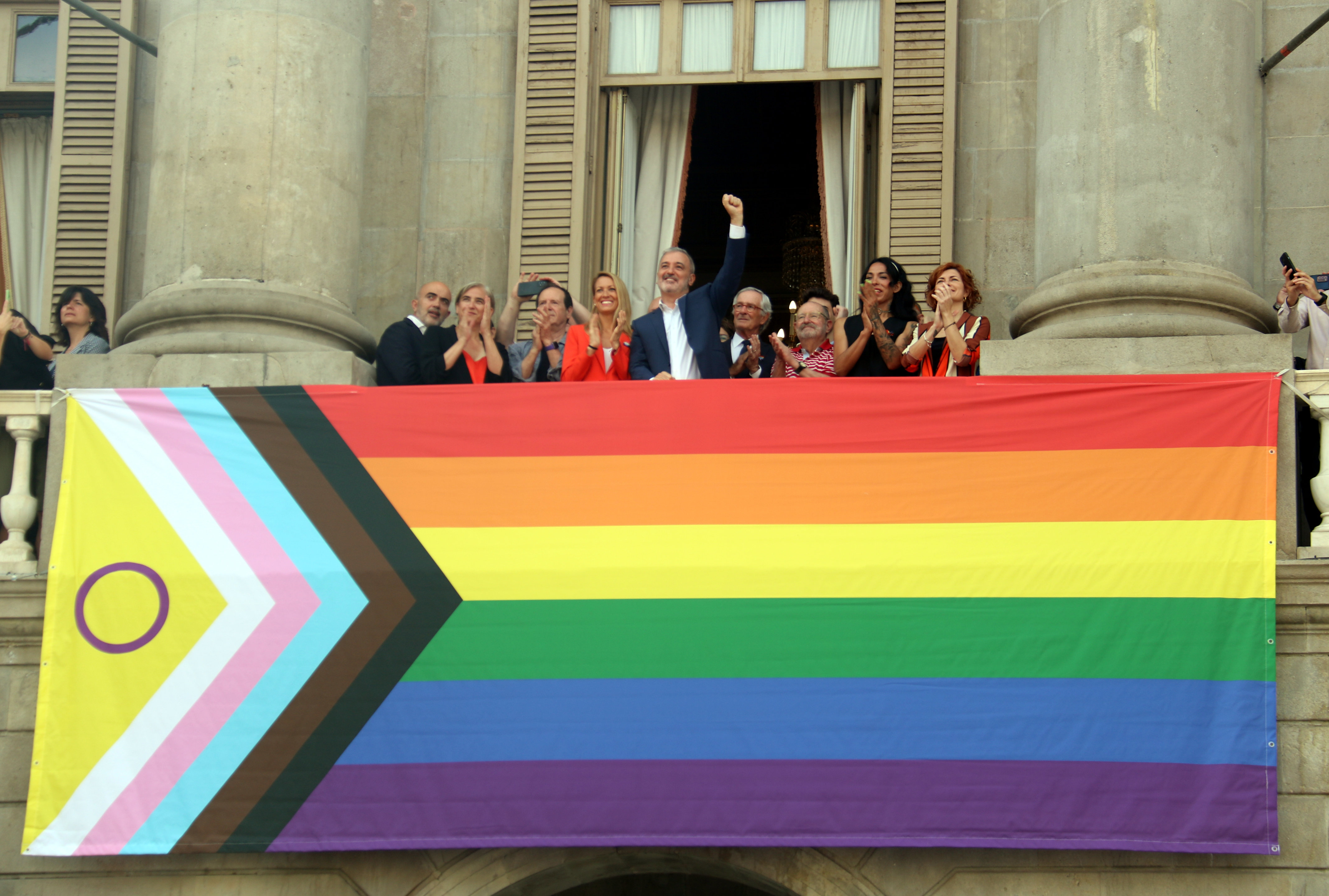 Barcelona mayor Jaume Collboni with various councilors and LGBT+ activists as Pride is marked at City Hall