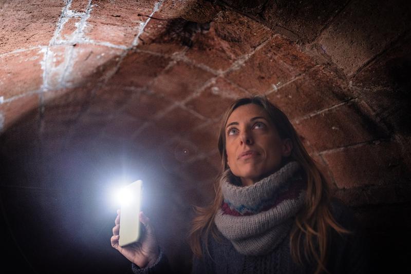 Photographer Ana Sánchez in an air raid shelter below Carrer Mallorca in Barcelona