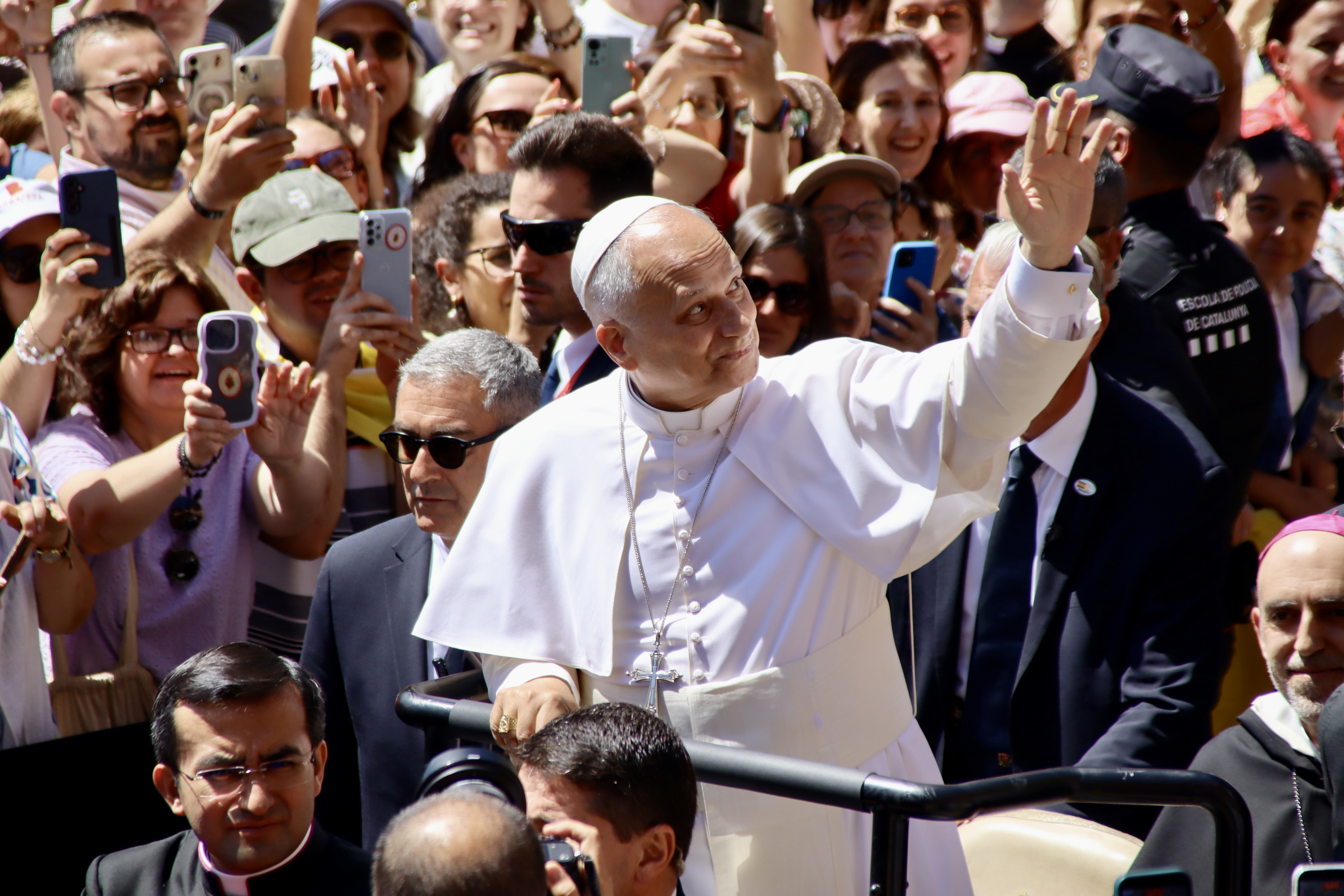 The Pope waves to the crowd on his arrival at Montserrat