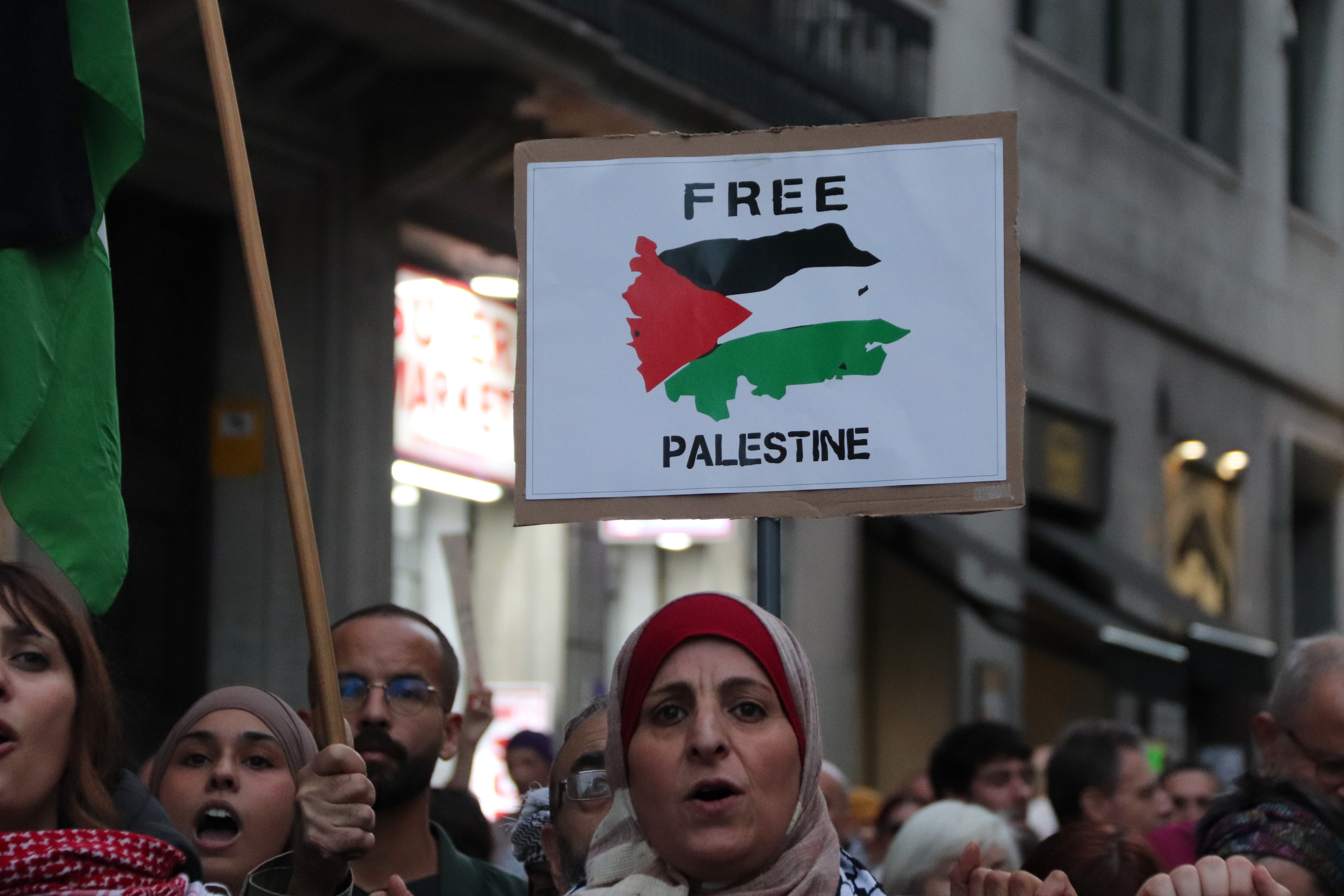 People chanting 'Free Palestine' during a pro-Palestine protest in Barcelona on November 11, 2023