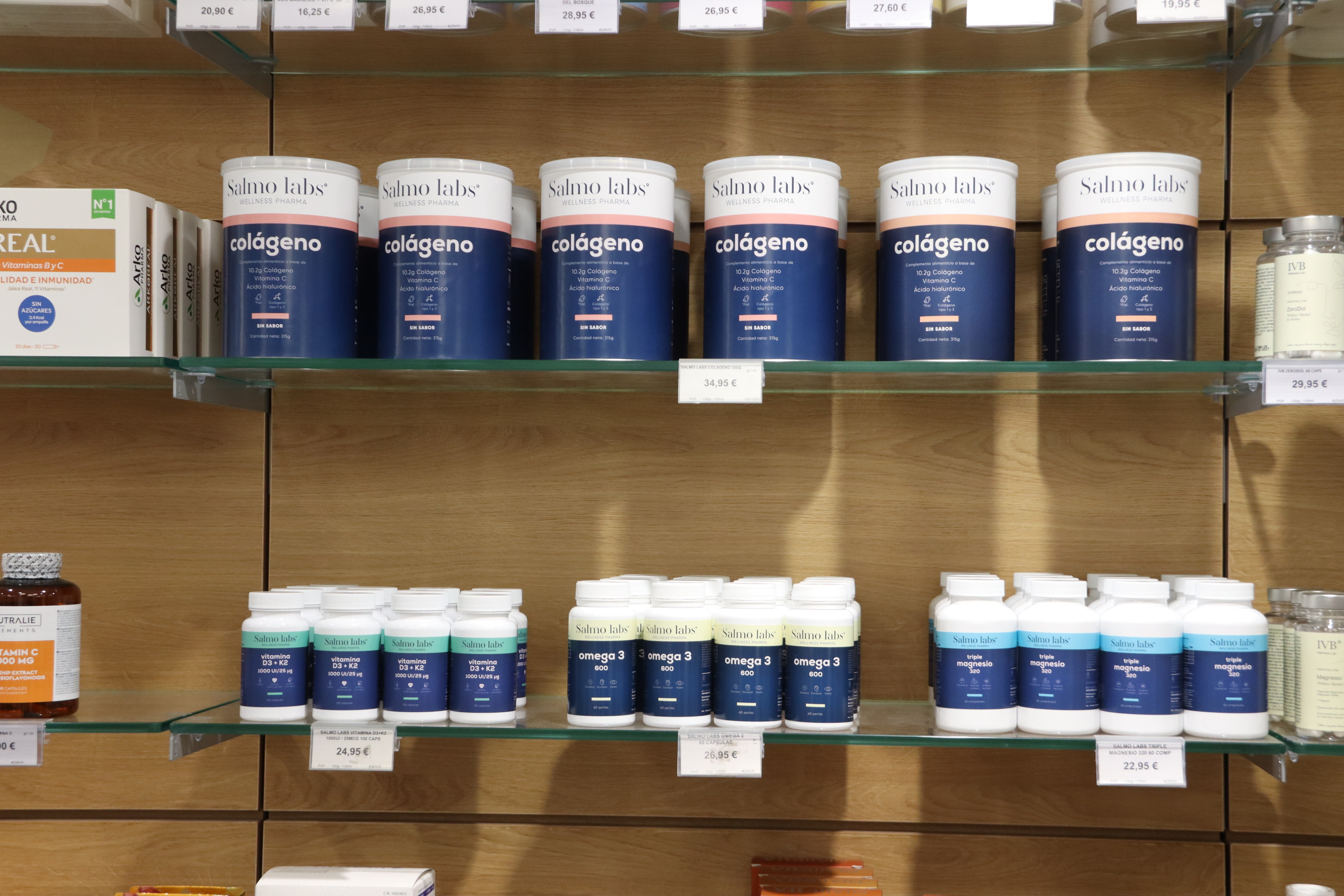 Shelves stocked with supplements in a pharmacy