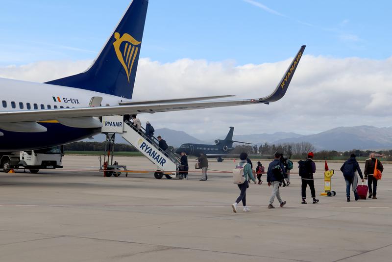 Passengers boarding a flight at Girona airport on March 17, 2023