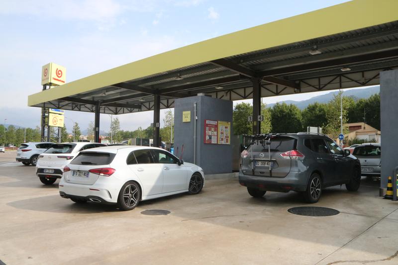 Various cars at a petrol station in La Jonquera