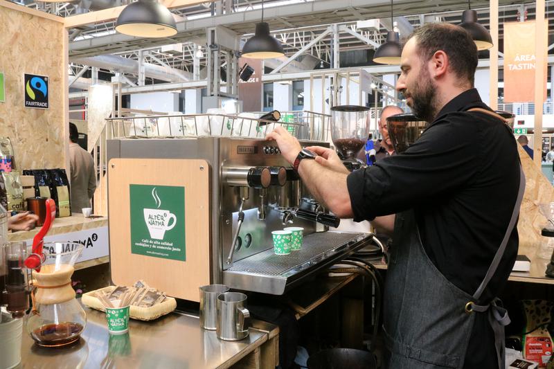 An exhibitor prepares a coffee at the 2023 Fórum Coffee Festival on September 29, 2023