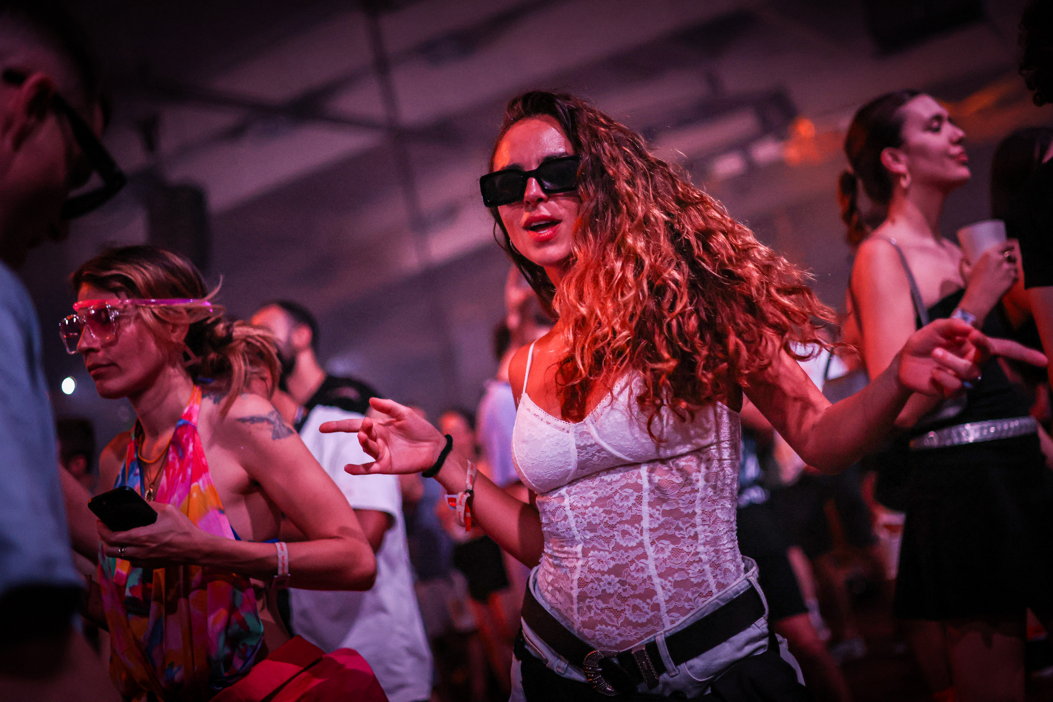 Festival-goers dancing at the Sónar 2024 on June 14, 2024