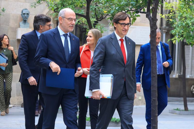 Catalan President Salvador Illa and Minister for Foreign Action, Jaume Duch, head to a cabinet meeting