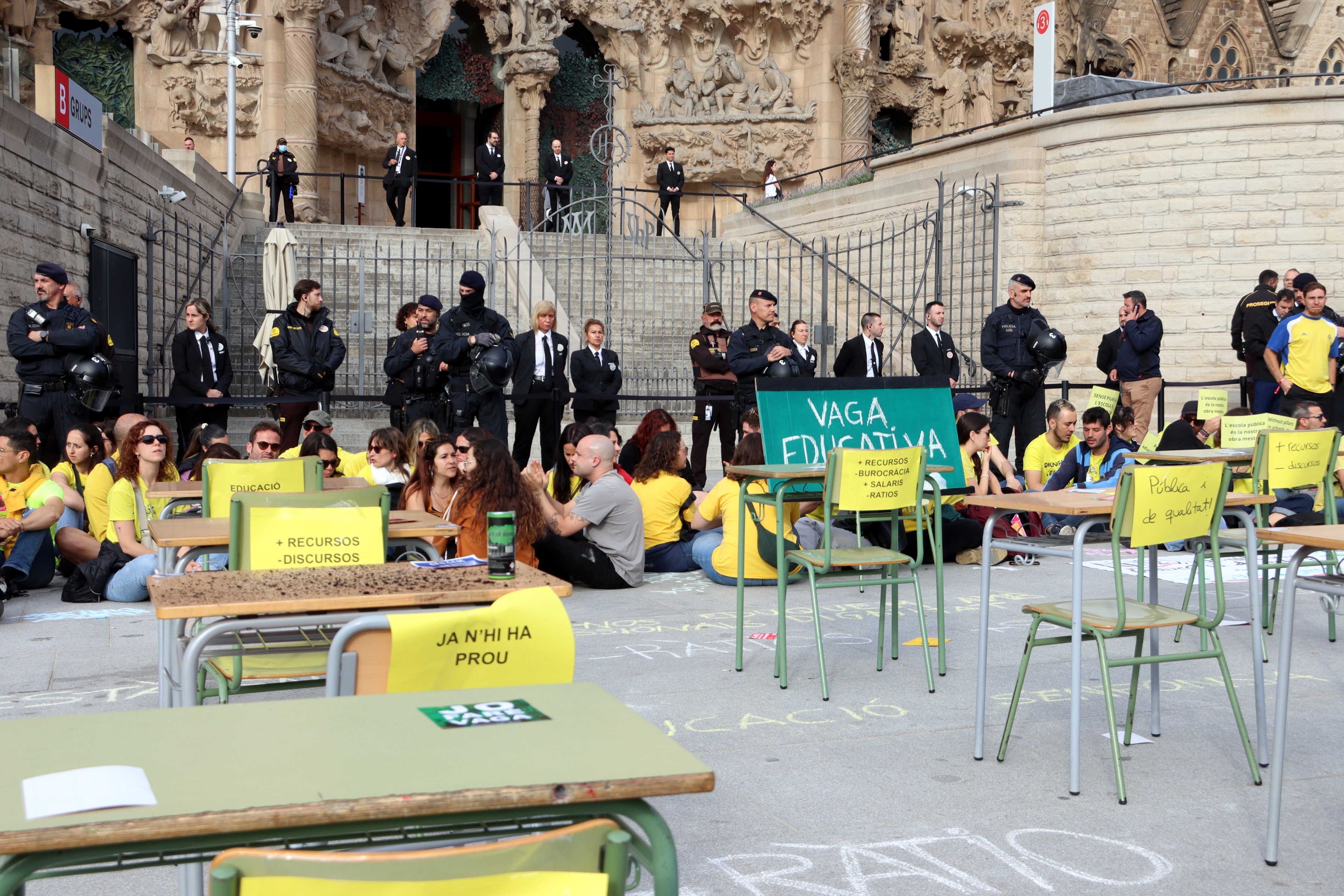 Tables and chairs in front of the Nativity facade of the Sagrada Família, as part of the education strikes
