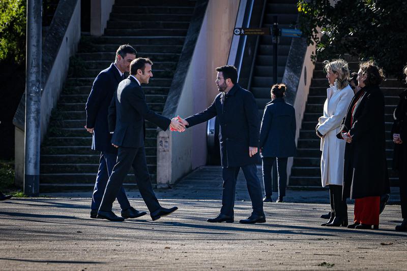 Catalna president Pere Aragonès meets French President Emmanuel Macron besides Spanish PM Pedro Sánchez in Barcelona on January 19, 2023