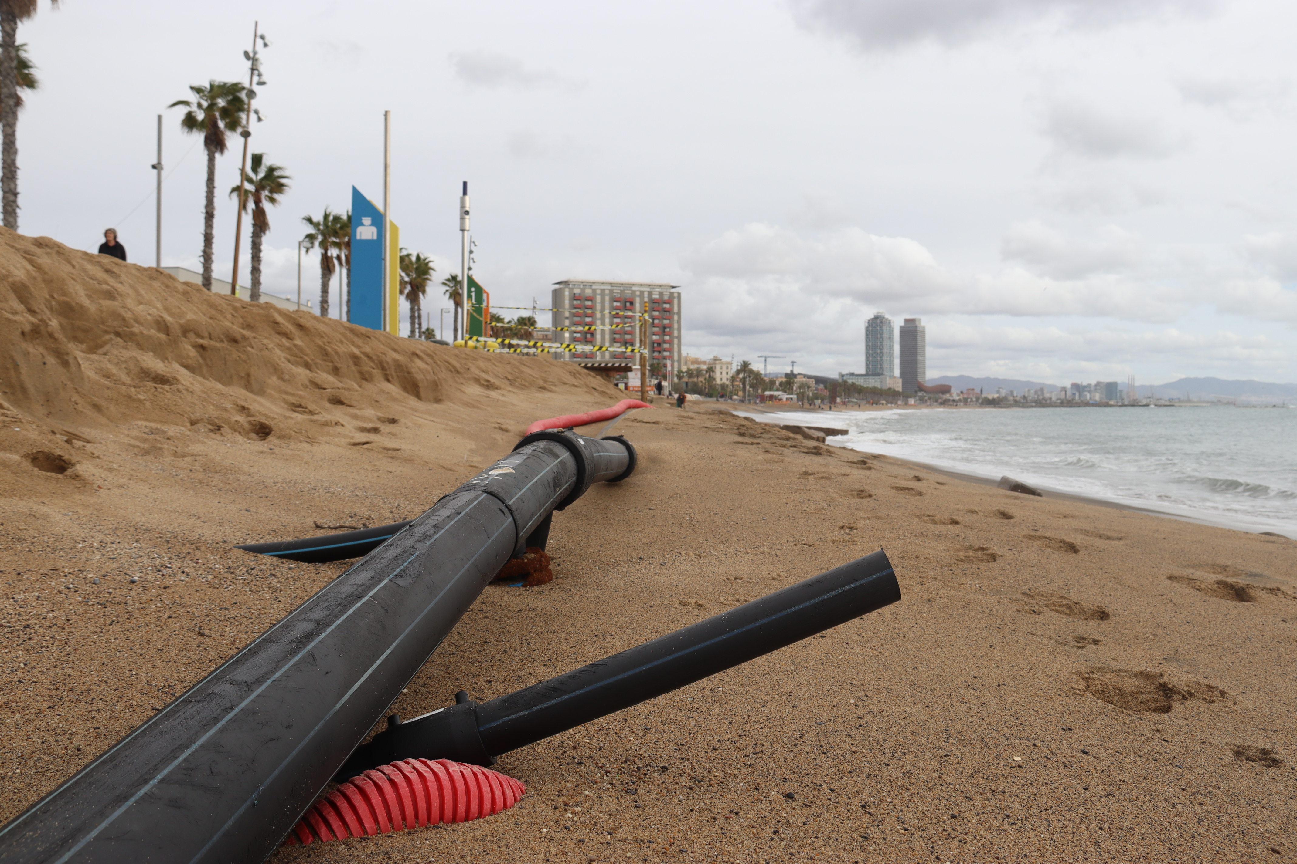 Plastic pipes usually covered by sand on the Sant Sebastià beach in Barcelona, exposed followed the Storm Nelson over Easter