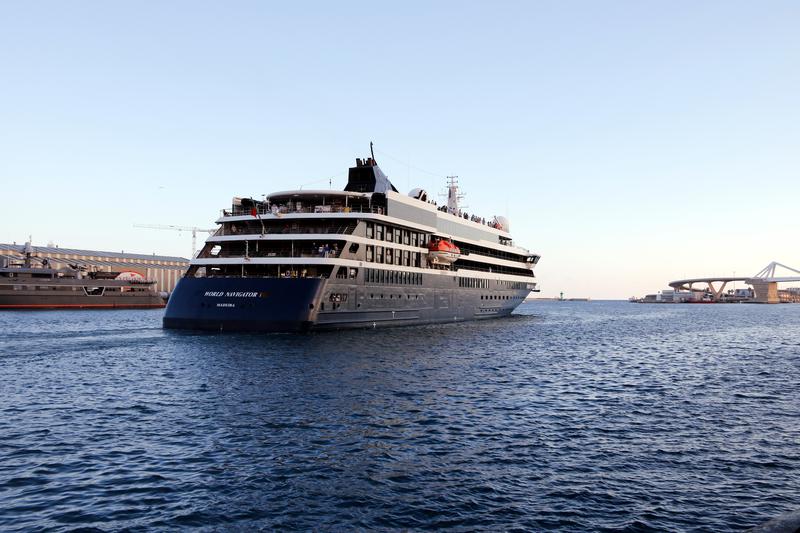 The 'World Navigator' leaving Barcelona port after being the last cruise ship to dock in Barcelona's north dock