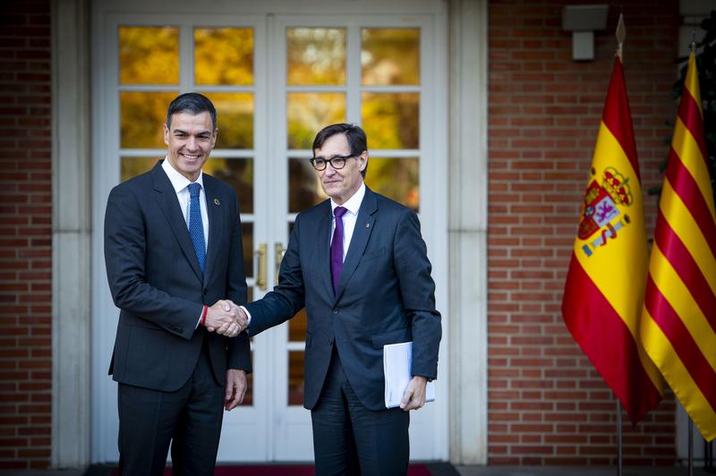 Catalan president Salvador Illa and Spanish PM Pedro Sánchez facing journalists before a meeting in La Moncloa, Spain's government headquarters in Madrid, on November 22, 2024