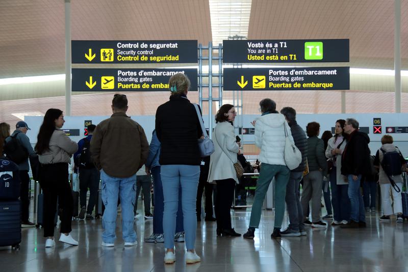 Passengers at Barcelona’s El Prat airport during the Easter holiday return travel period.