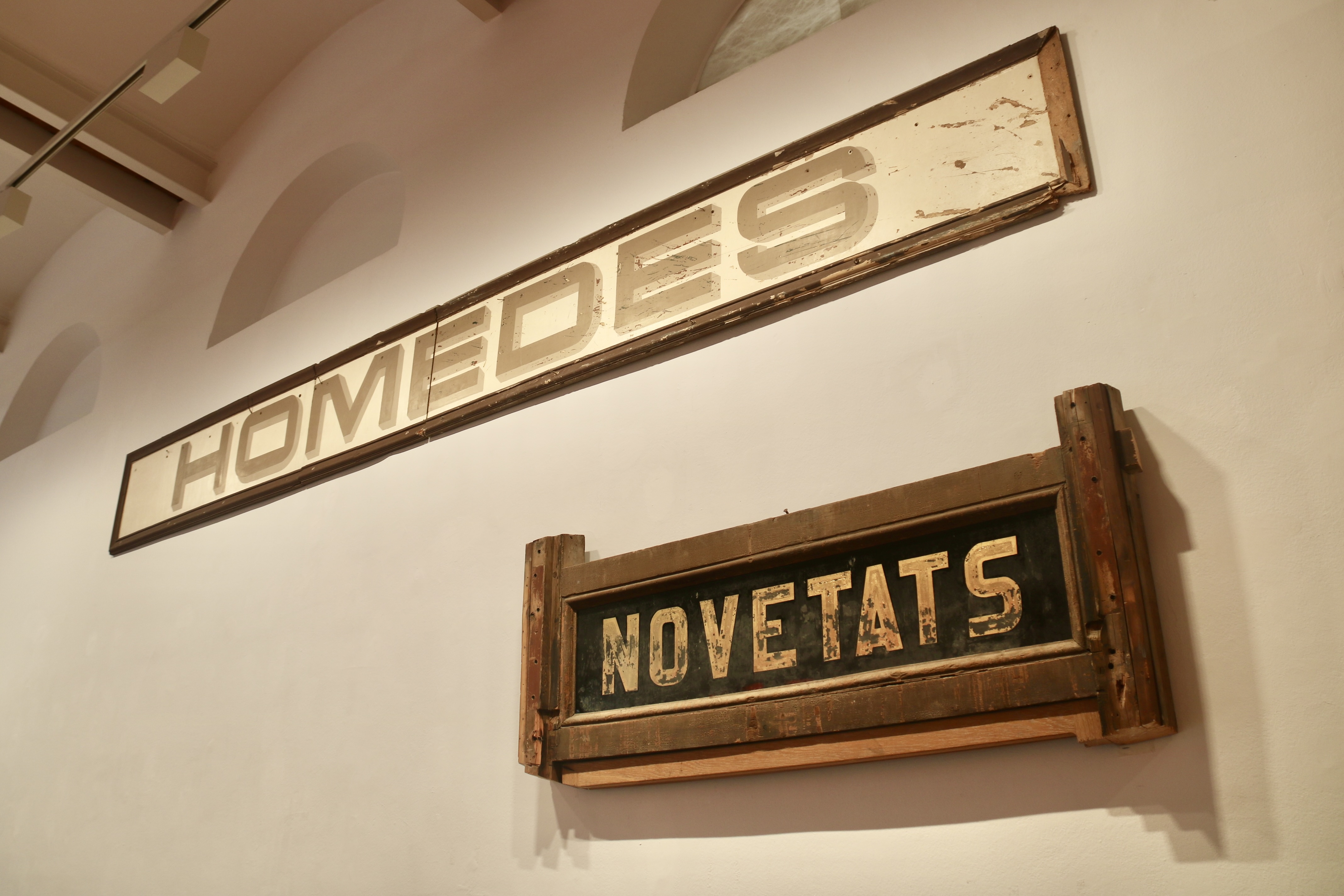 Old signs from local businesses on display in an exhibition by Patrimoni Gràfic Sabadell