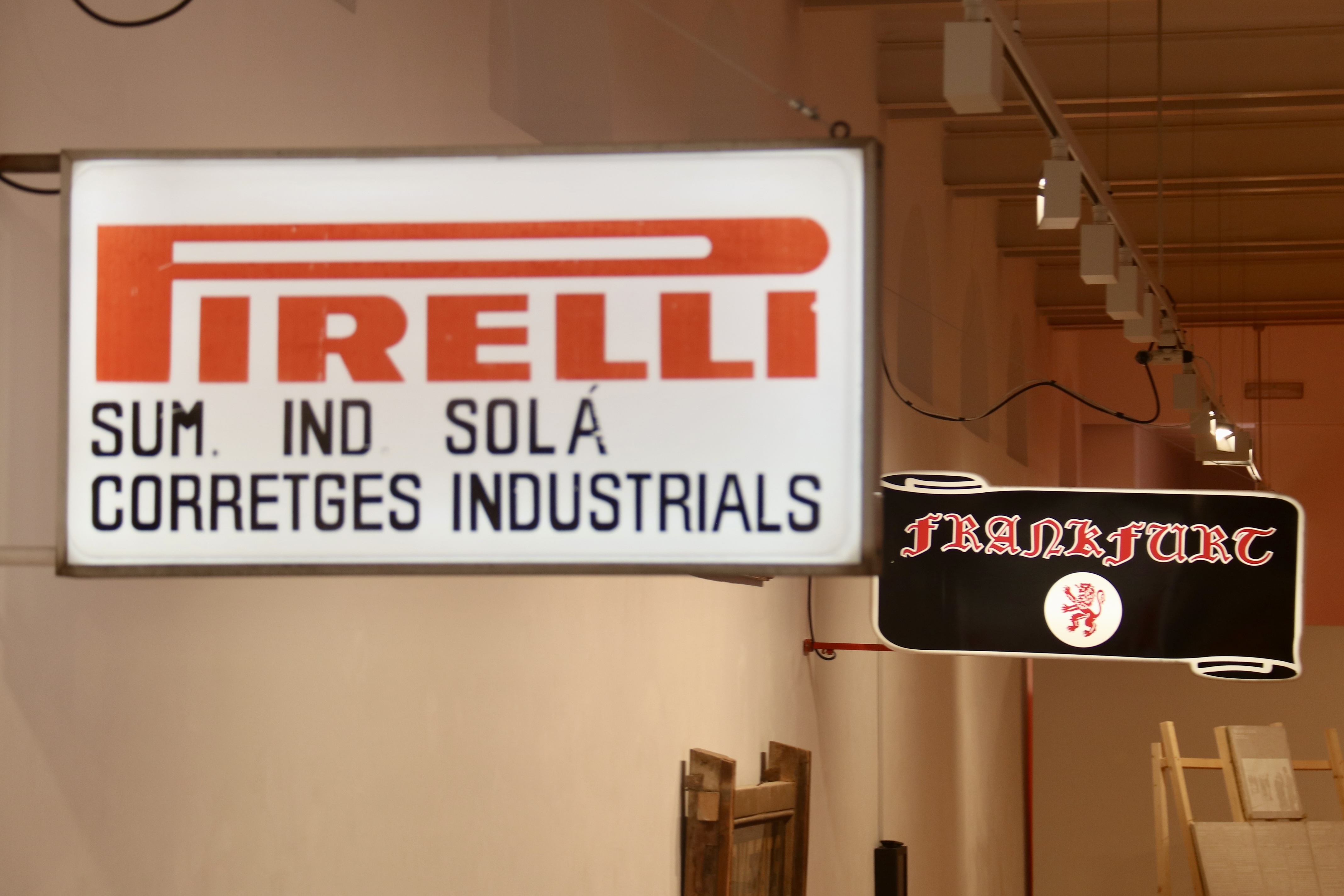 Signs from a old garage and Frankfurt Permanyer, on display in an exhibition by Patrimoni Gràfic Sabadell