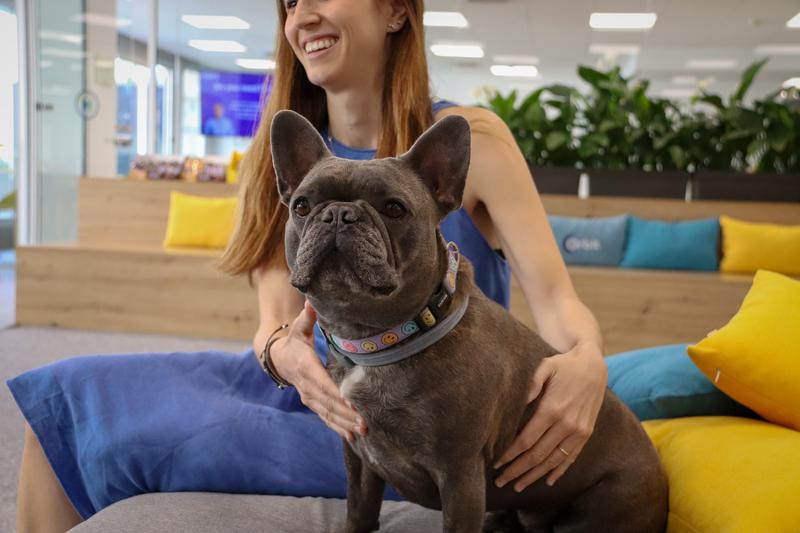 Dog Pipa and her owner Marta Muñoz at the office