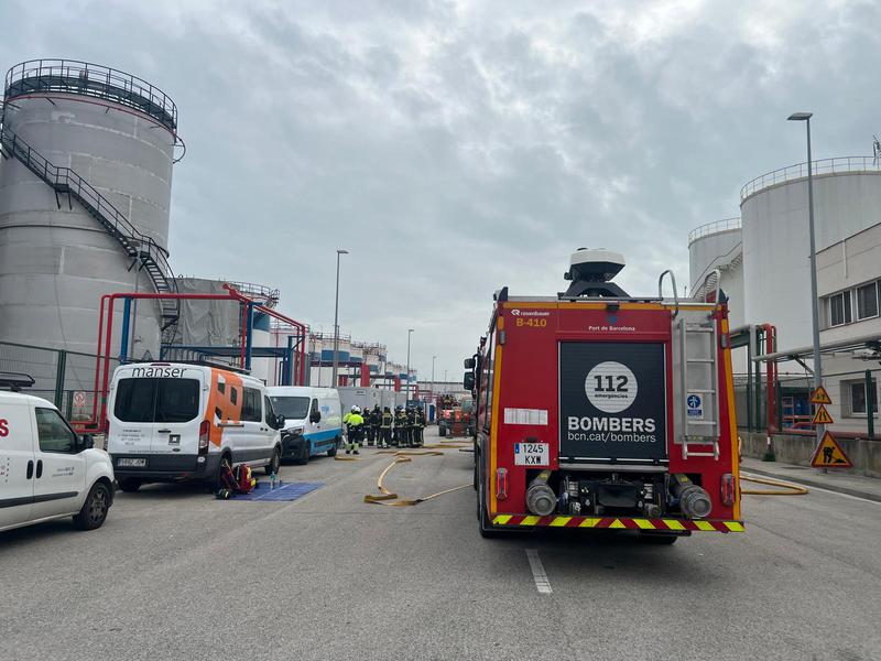 Emergency services attend the incident at the damaged tank