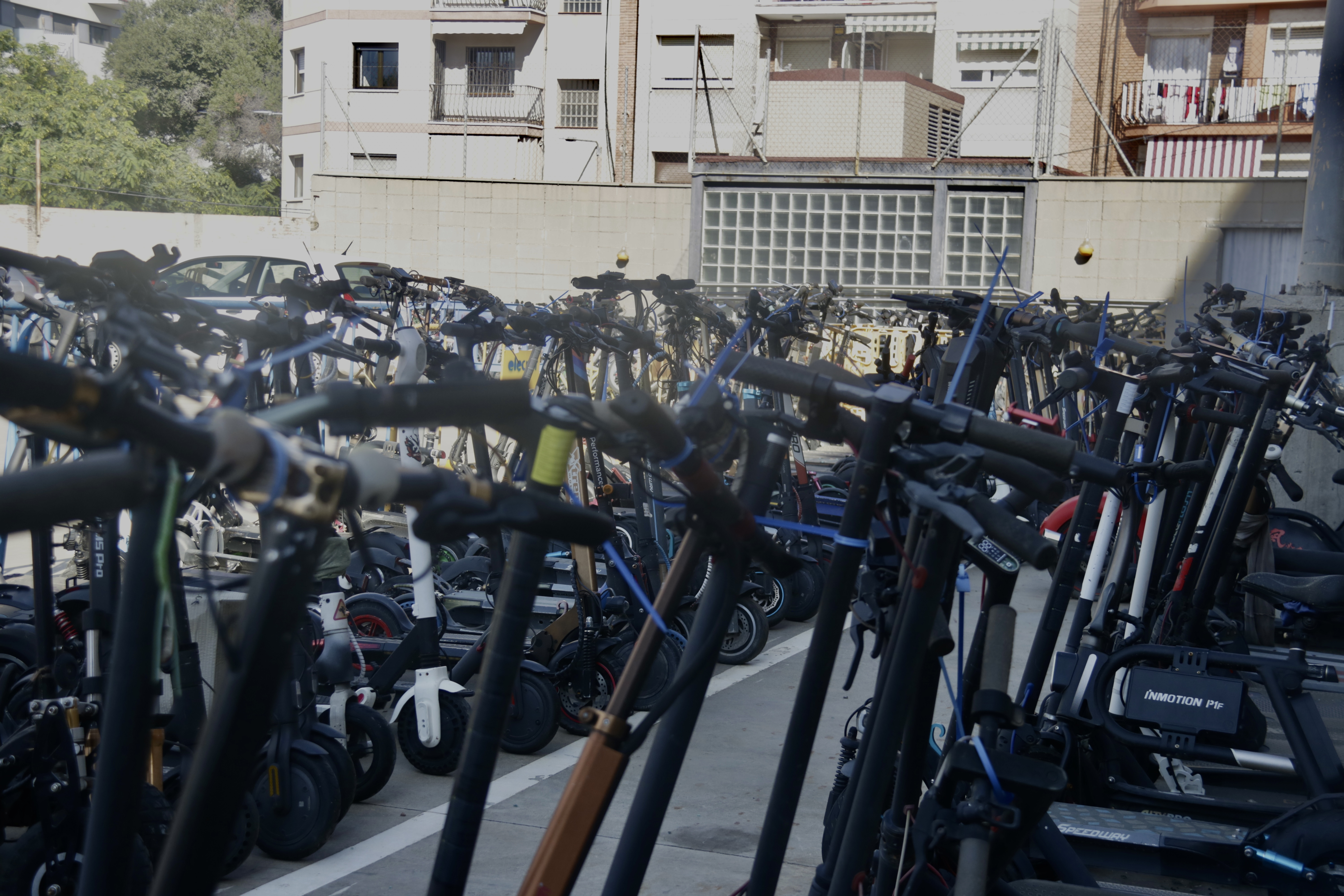 E-scooters pile up at the local depot of Santa Coloma de Gramanet.