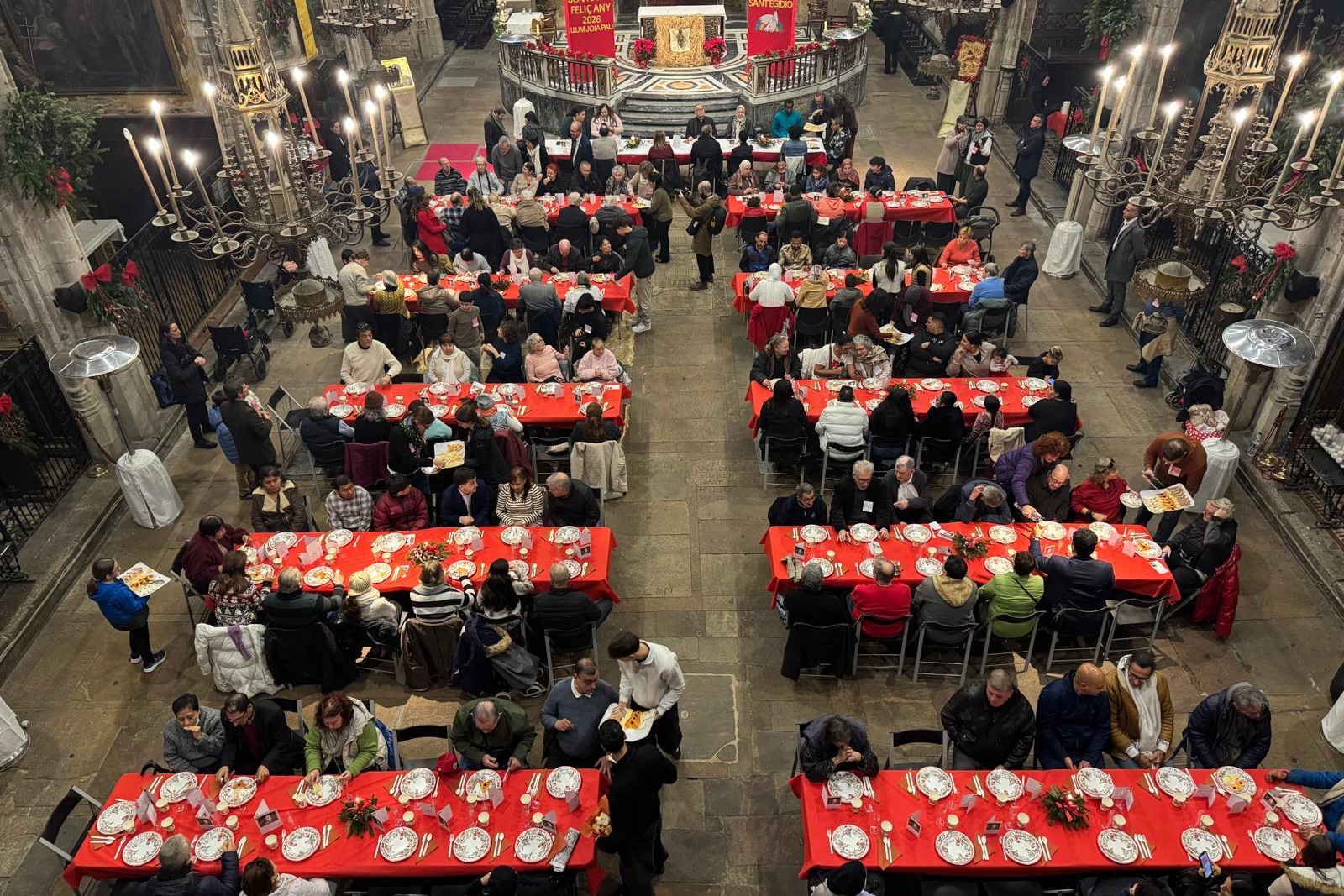 The Sant'Egidio community's Christmas lunch in Barcelona's Just i Pastor Basilica on December 25, 2025