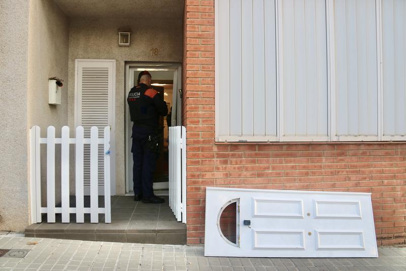 A Mossos d'Esquadra Catalan police officer seen during one of the raids in Sabadell