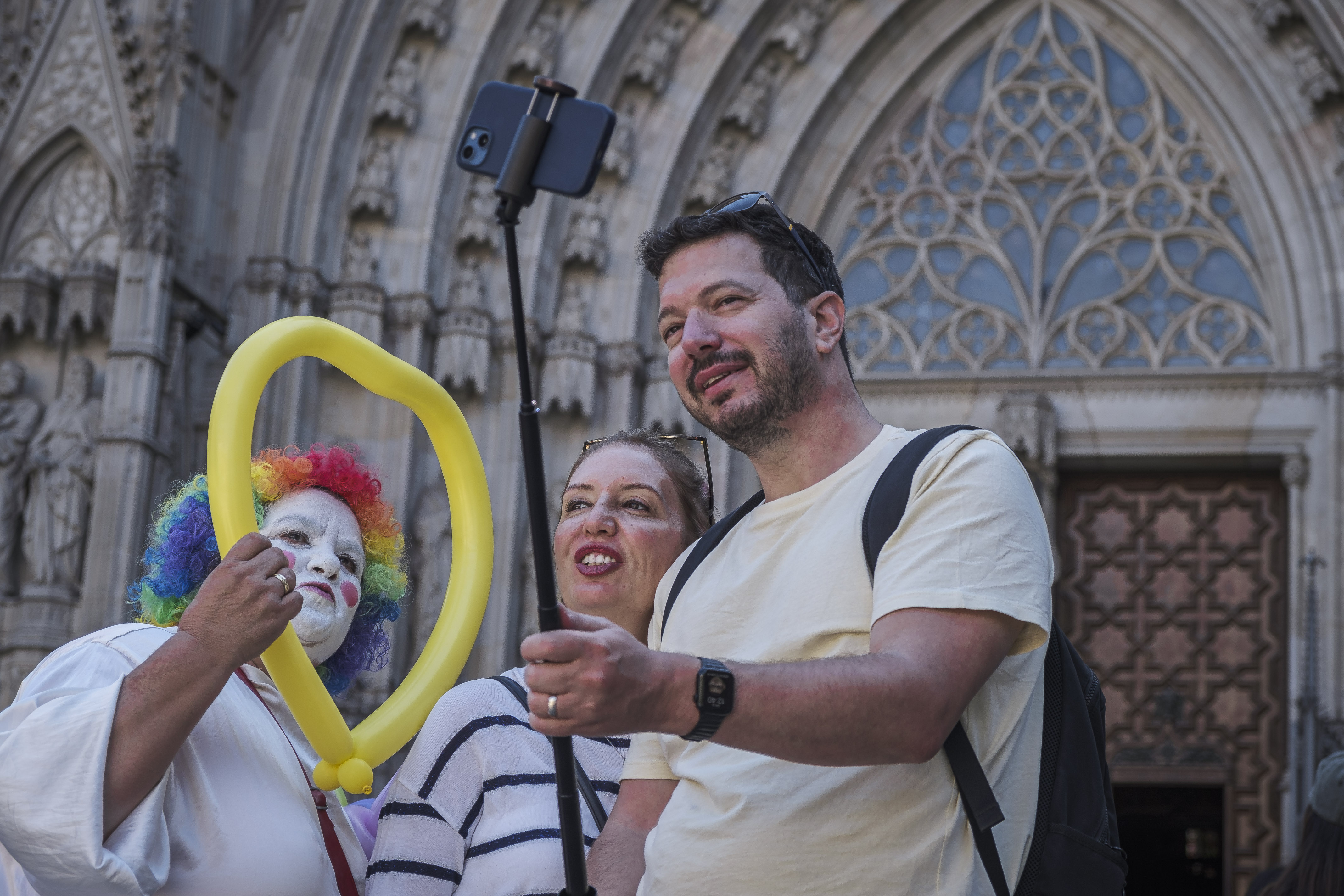 Tourists taking a selfie in front of Barcelona's Cathedral