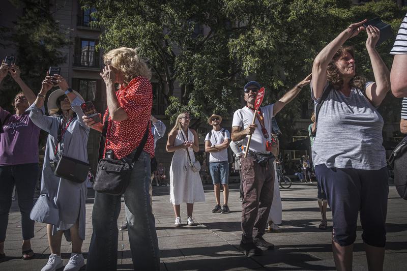 Tourists on a walking tour around Barcelona