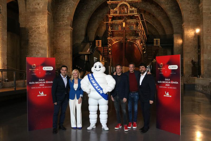 Michelin guide responsibles accompanied by Michelin starred chefs who will take part in the 2024 Michelin star award ceremony during the announcement on March 14, 2023 at Barcelona's Maritime Museum