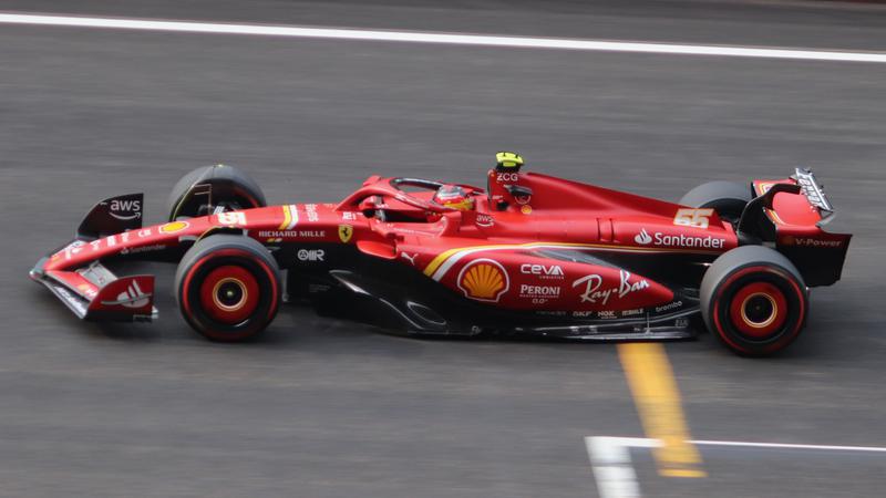 Carlos Sainz driving a Scuderia Ferrari Formula 1 car at the 2024 Chinese Grand Prix on April 20, 2024