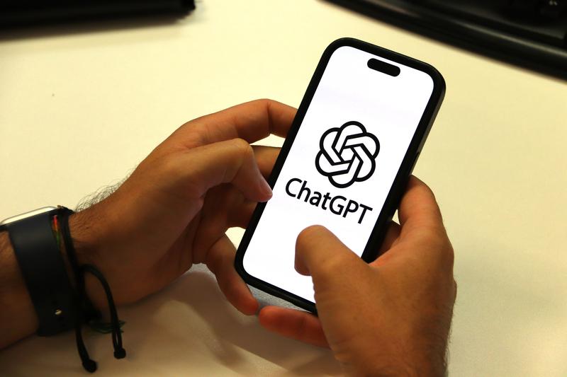 A person using ChatGPT on their mobile phone